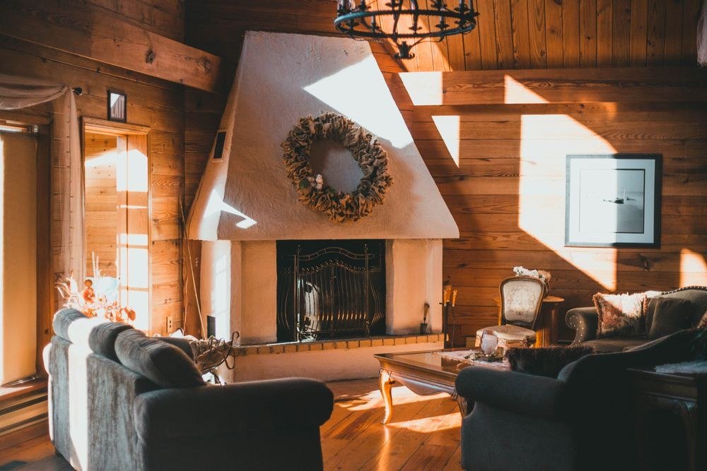 A cozy furnished cabin living room set up as a short-term rental, an edge case DSCR lenders underwrite differently